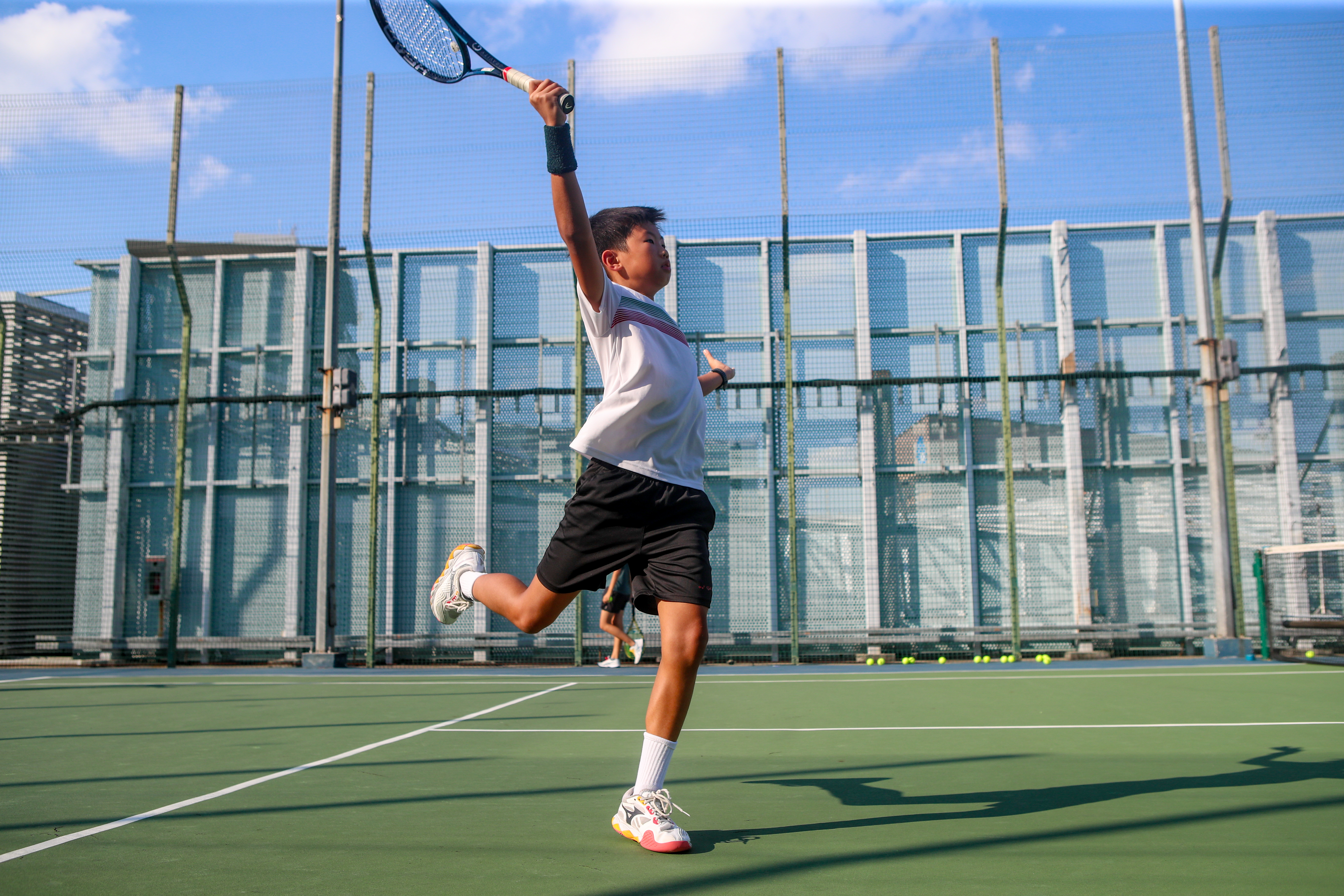 Group tennis lesson at NTU one-north Buona Vista Singapore